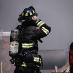 shallow focus photo of firefighter