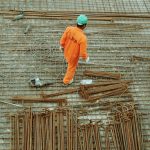 man walking on construction site